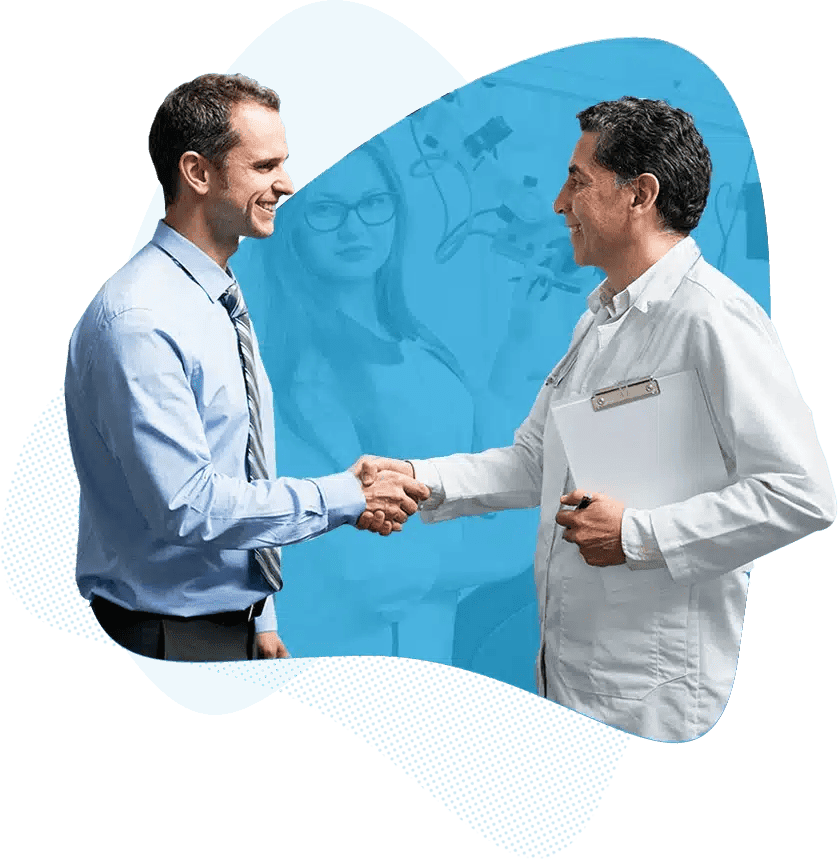 IT consultant shaking hands with dentist in Houston dental office
